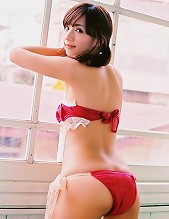 Entralling gravure idol in red racey lingerie and cute pig tails